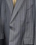 Barclays pak van Scabal stof in donkergrijs met oker strepen