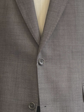 Grijs sharkskin opgesneden doorgeputte revers, Van Gils